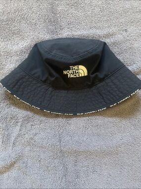 The North Face Black Bucket Hat with White Logo Trim